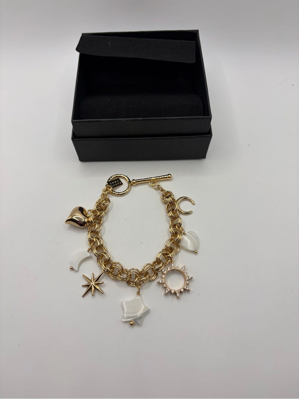Gold-Tone Charm Bracelet with White Enamel Accents